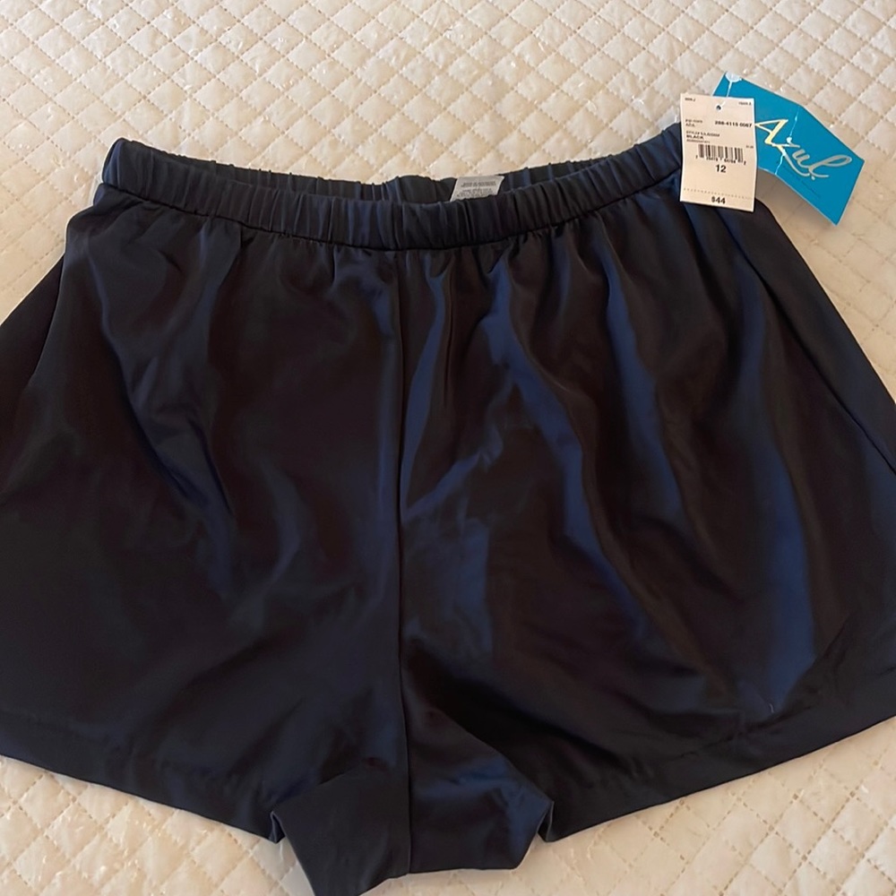 New with tags women’s bathing suit shorts.
